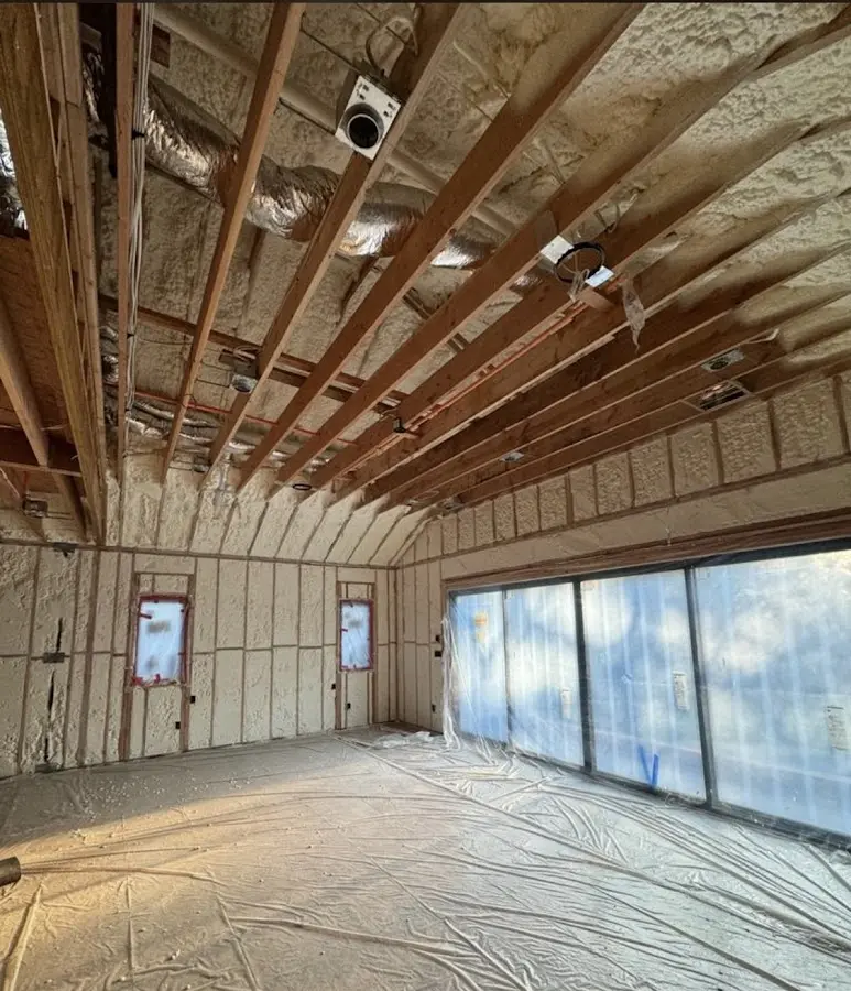 Interior walls and ceiling insulated with spray foam during new construction in Cedar City